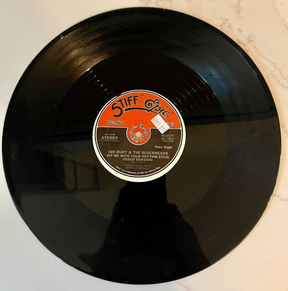 Ian Dury & The Blockheads* : Hit Me With Your Rhythm Stick / Reasons To Be Cheerful, Pt. 3 (12", Single)